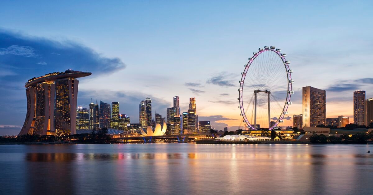 Singapore skyline at sunset viewed from Gardens by the Bay East