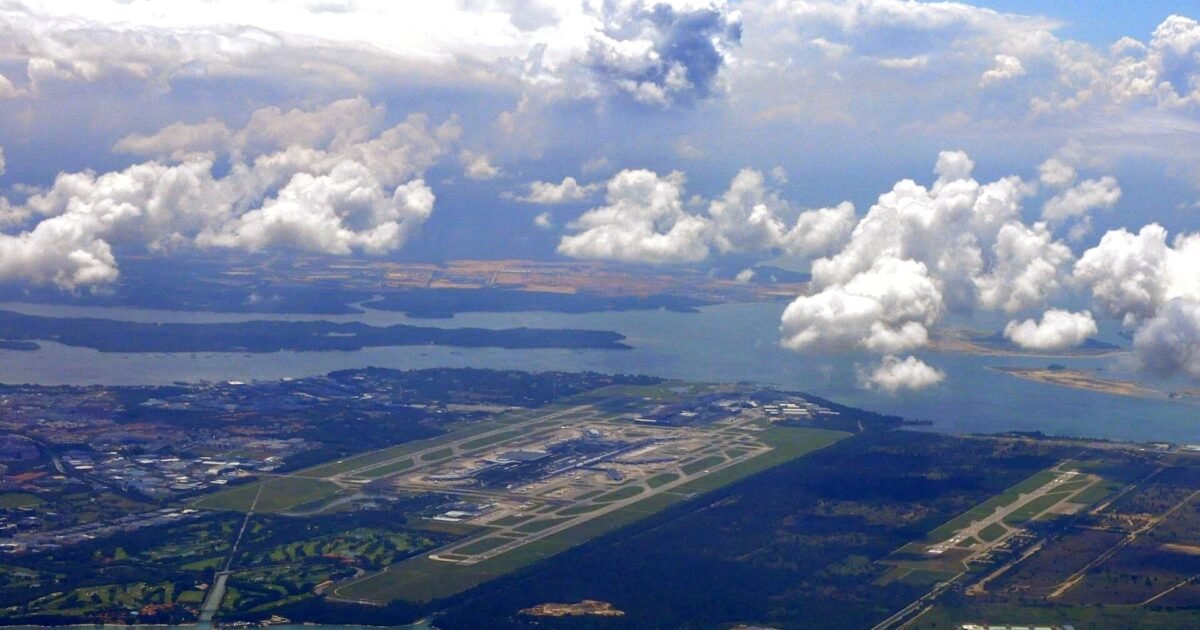 Aerial landscape view of Singapore Changi Airport and surrounding air base