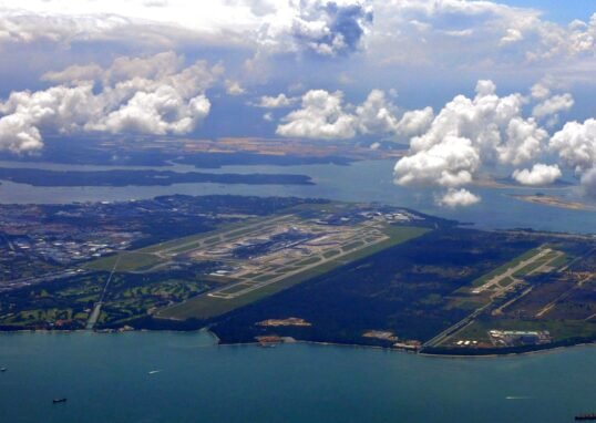 Aerial landscape view of Singapore Changi Airport and surrounding air base