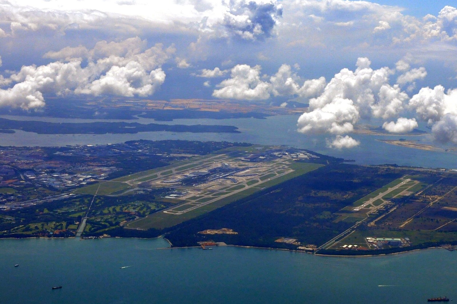 Aerial landscape view of Singapore Changi Airport and surrounding air base