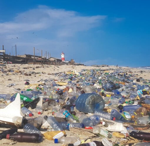 Landscape view of plastic waste covering a beach in Accra, Ghana