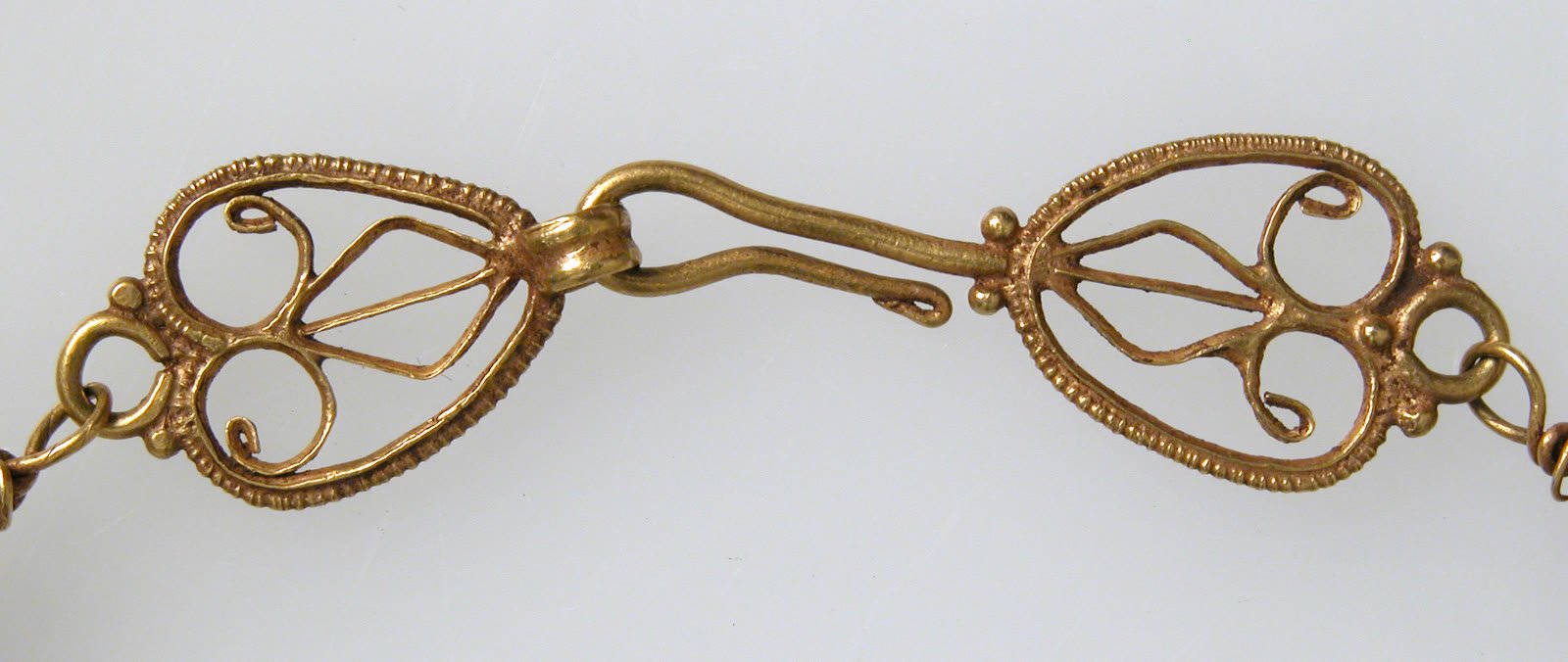 Horizontal photograph of a gold necklace with amethysts, glass and gold beads from The Metropolitan Museum of Art