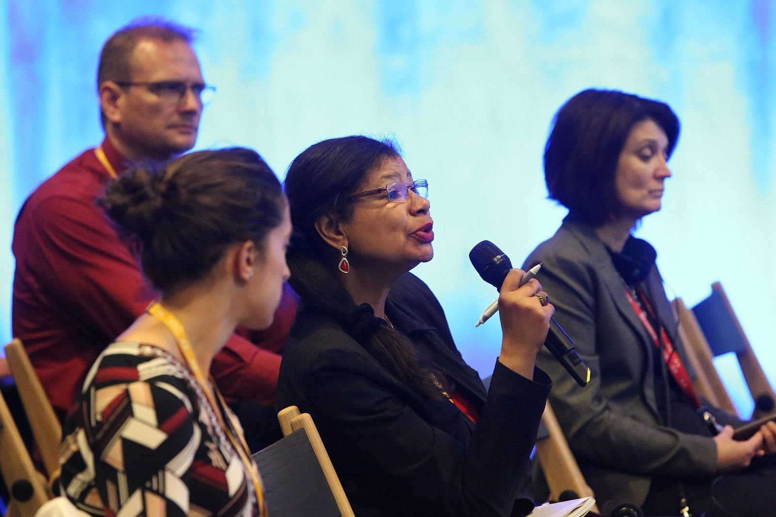A journalist asks a question at a climate press conference at an informal meeting of EU environment ministers