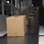 Packages on a warehouse conveyor belt