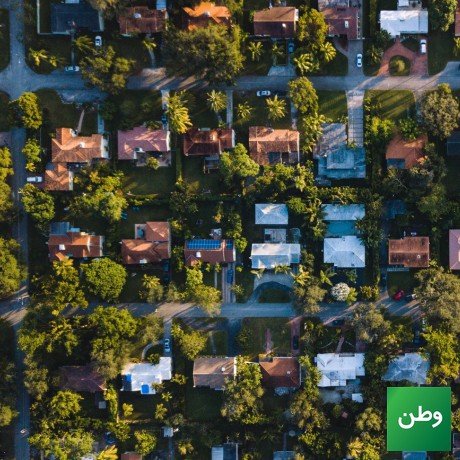 Aerial view of a US residential neighborhood as US home sellers' price cuts reach a record share