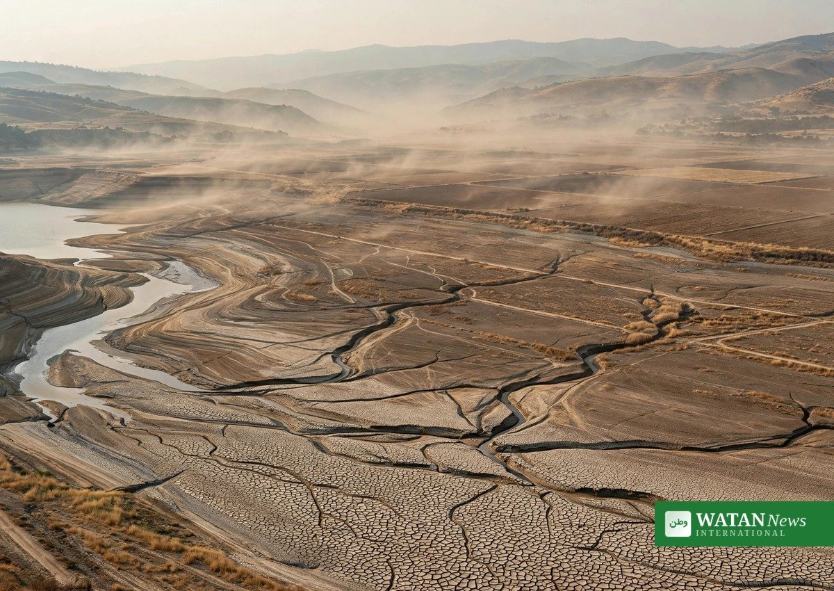 Parched river basin with exposed cracked shorelines illustrating declining global water resources