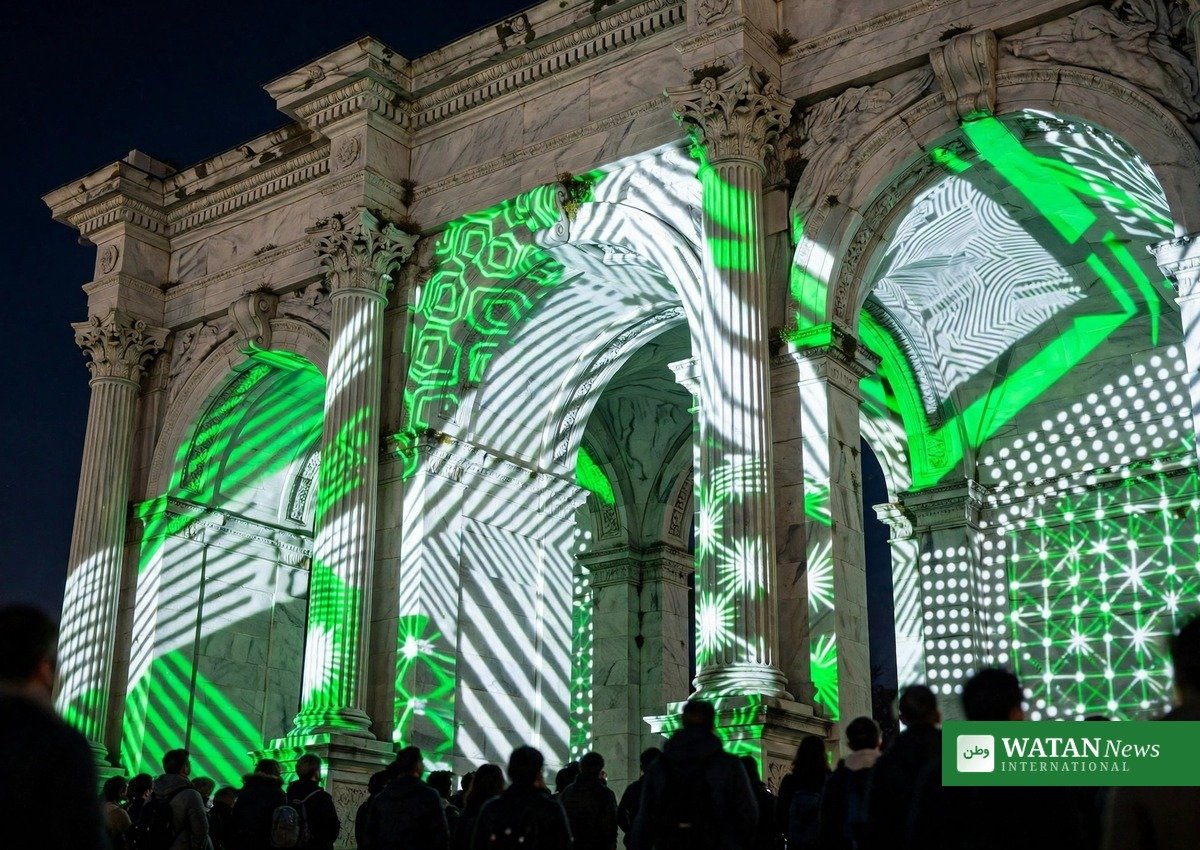 Yadgar-e-Fatah monument Islamabad: green-and-white projection mapping light show on the monument arches at night