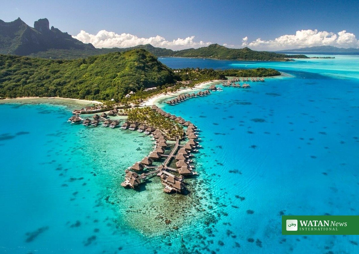 Bora Bora overwater bungalows beneath Mount Otemanu, luxury travel island