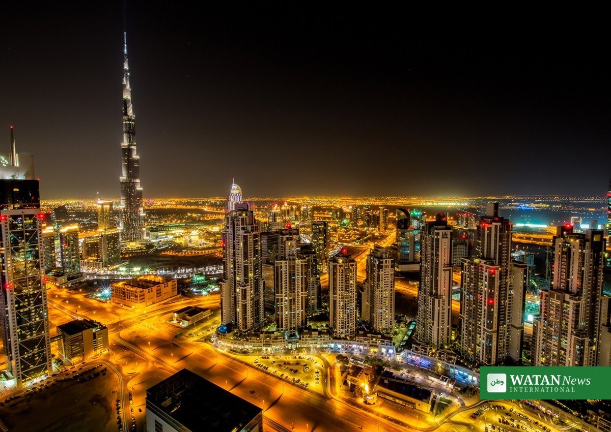 Dubai skyline at night with illuminated Burj Khalifa, luxury travel city