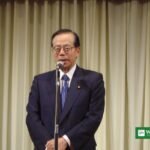 Former Japanese Prime Minister Yasuo Fukuda speaking at a podium