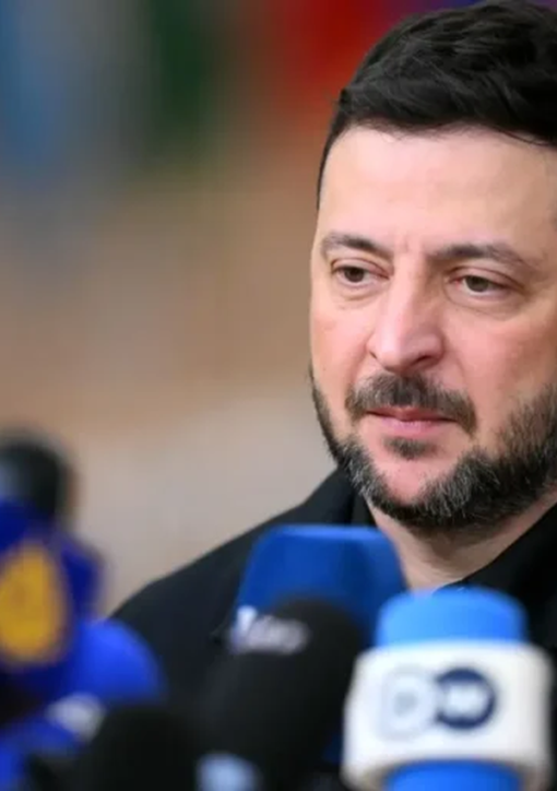 Ukrainian President Volodymyr Zelensky speaking to reporters at a press conference