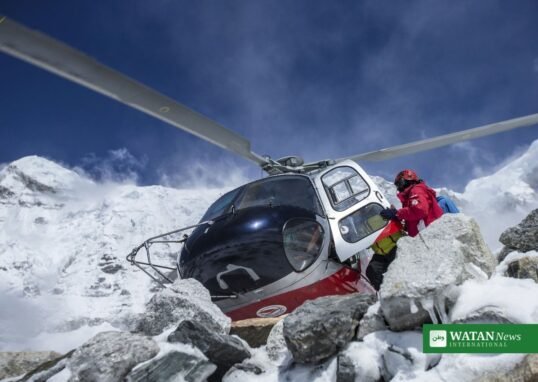 Helicopter in the snow-covered Himalayan mountains