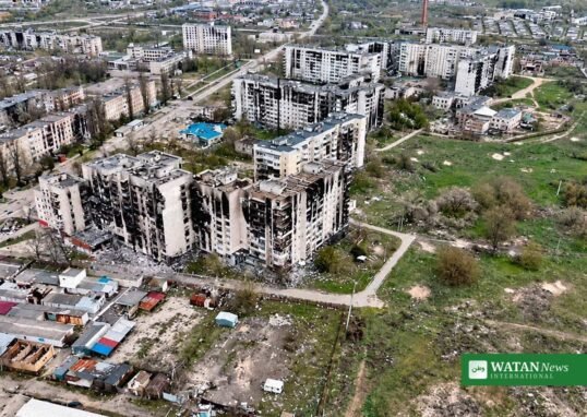 Damaged apartment blocks in the besieged town of Oleshky, Ukraine