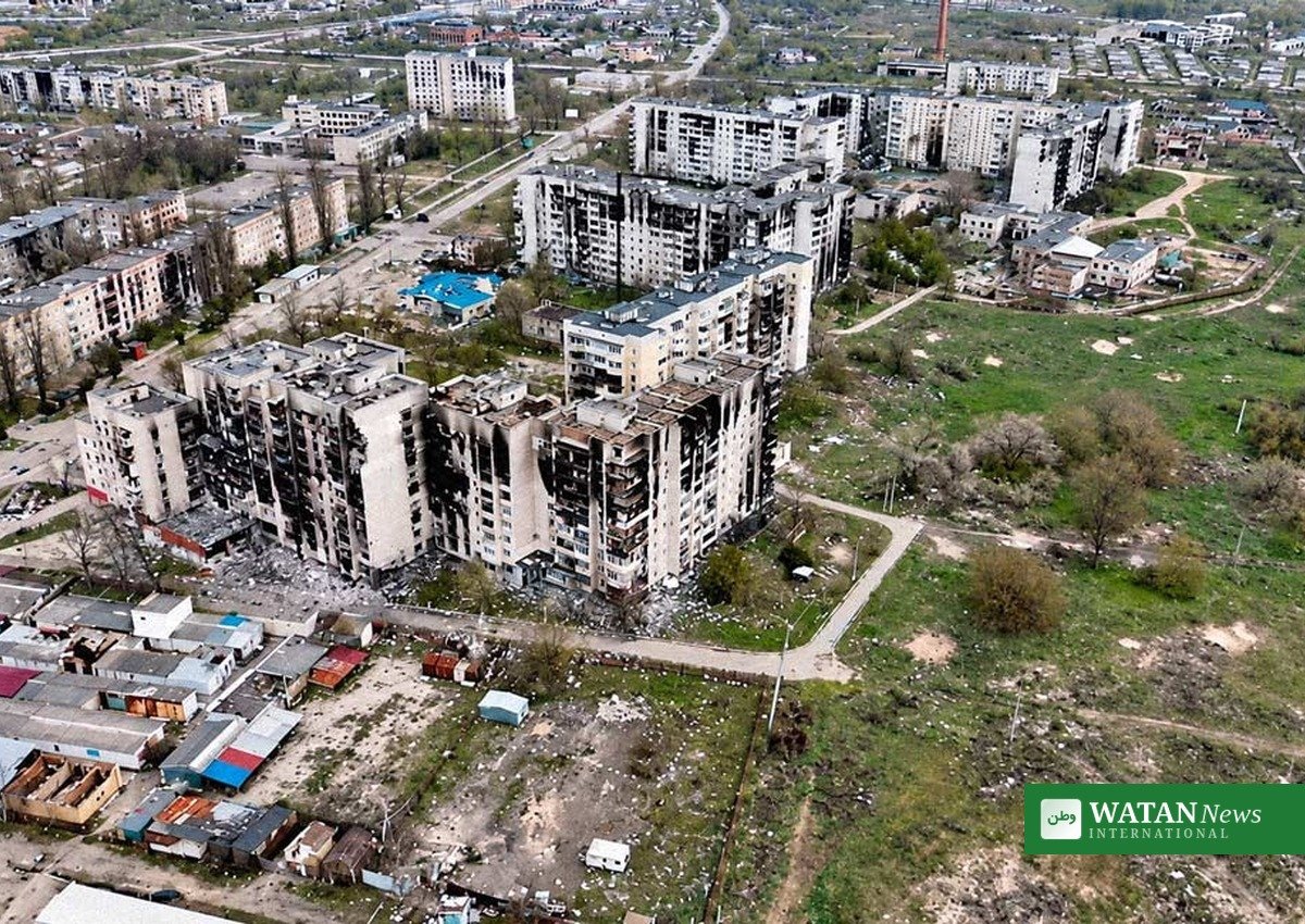 Damaged apartment blocks in the besieged town of Oleshky, Ukraine