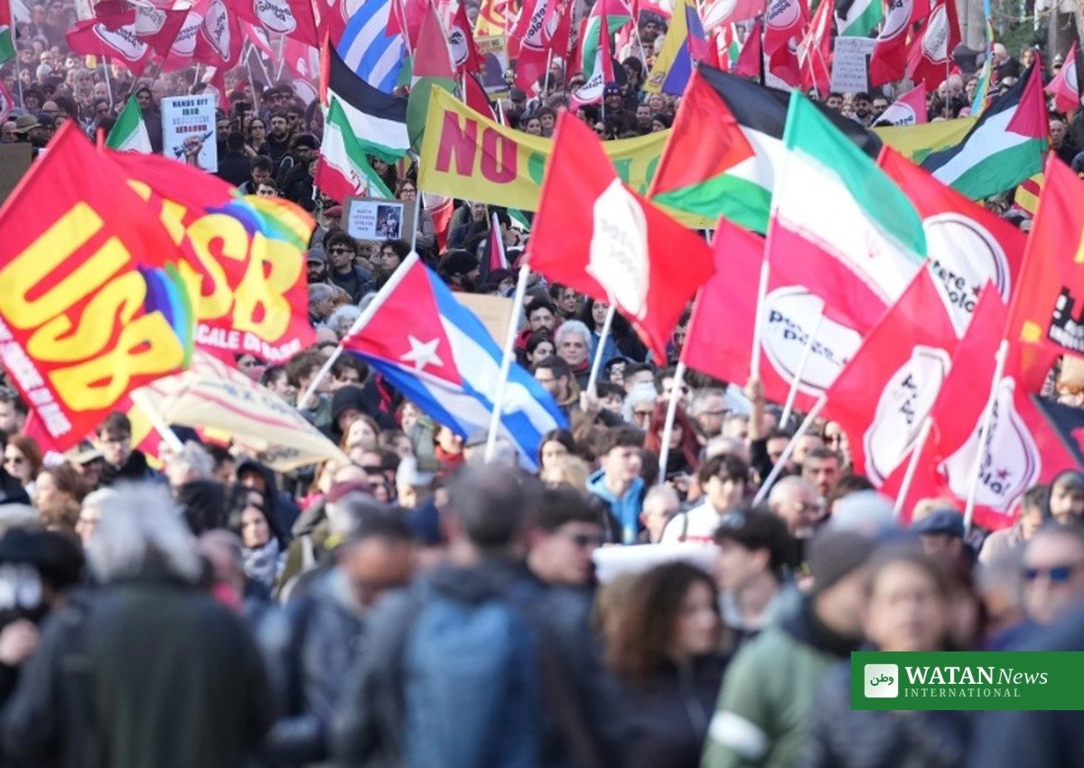 Demonstrators carrying USB union flags at a march in Italy