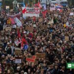 Young demonstrators march through Berlin during a student protest