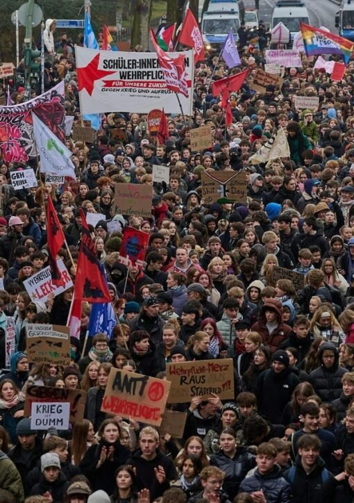 Young demonstrators march through Berlin during a student protest