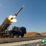 Patriot missile launcher firing an interceptor missile