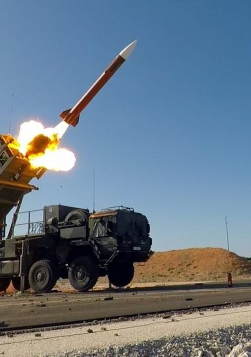 Patriot missile launcher firing an interceptor missile