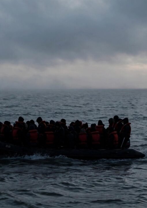 UK-France migration deal: small boat crossing the English Channel at dawn