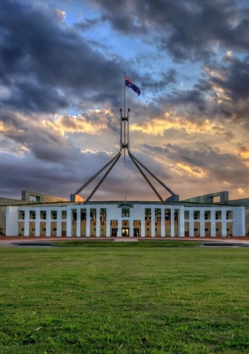 Parliament House in Canberra at dusk — Australian study on public support for climate action