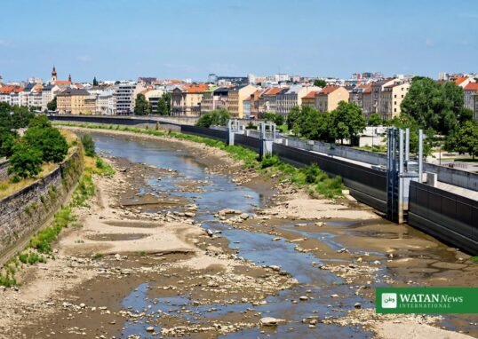 EU Climate Resilience Framework - low river in a European city during summer heat