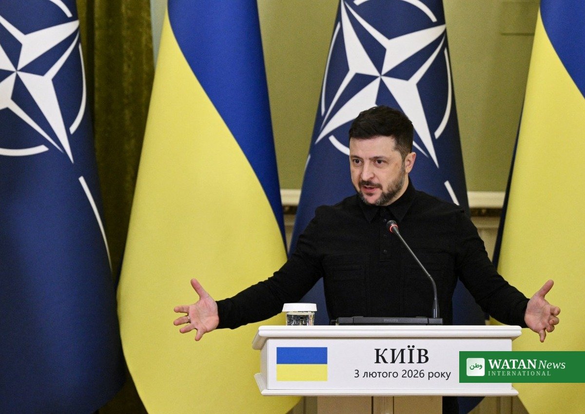 Ukrainian President Volodymyr Zelensky speaks at a podium in Kyiv