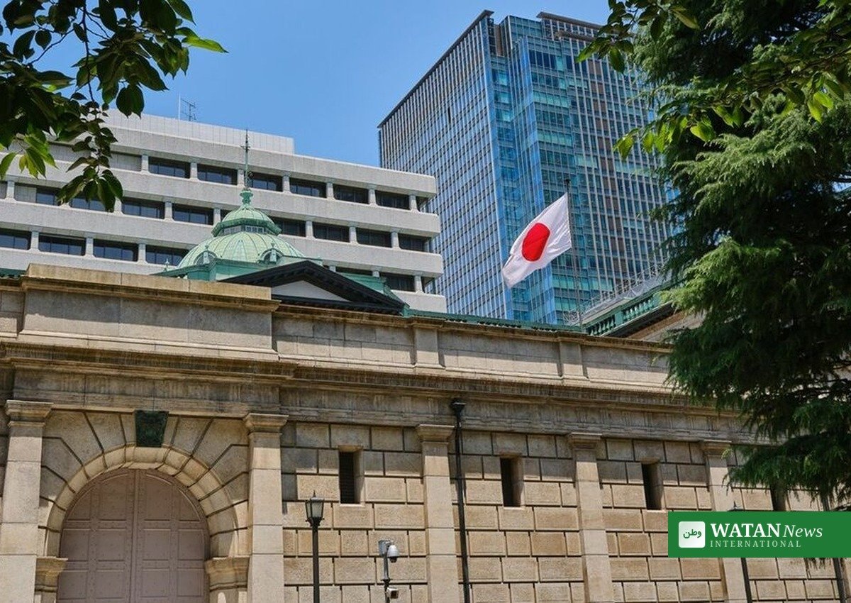 Bank of Japan headquarters in Tokyo with the Japanese flag