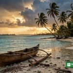 Traditional canoe on a Pacific atoll shoreline at golden hour ahead of the COP31 Pre-COP in Fiji and Tuvalu