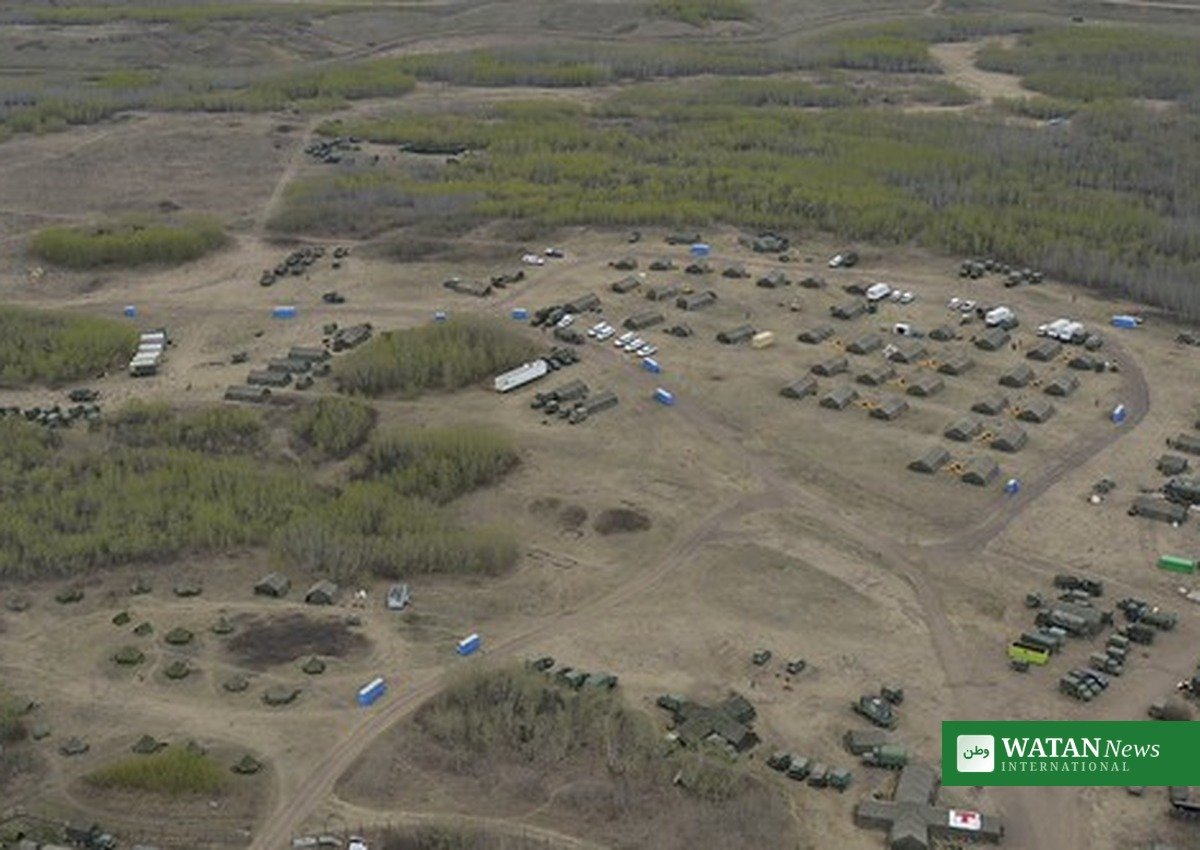 Tents and vehicles at the CFB Wainwright military base in Alberta