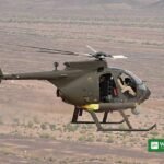 Saudi AH-6i helicopter in flight — the same aircraft type involved in the Najran crash