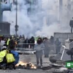 Macron national address after deadly France riots — protesters near burning barricades