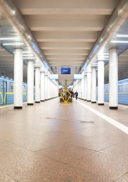 Kyiv metro station platform with blue trains in Ukraine