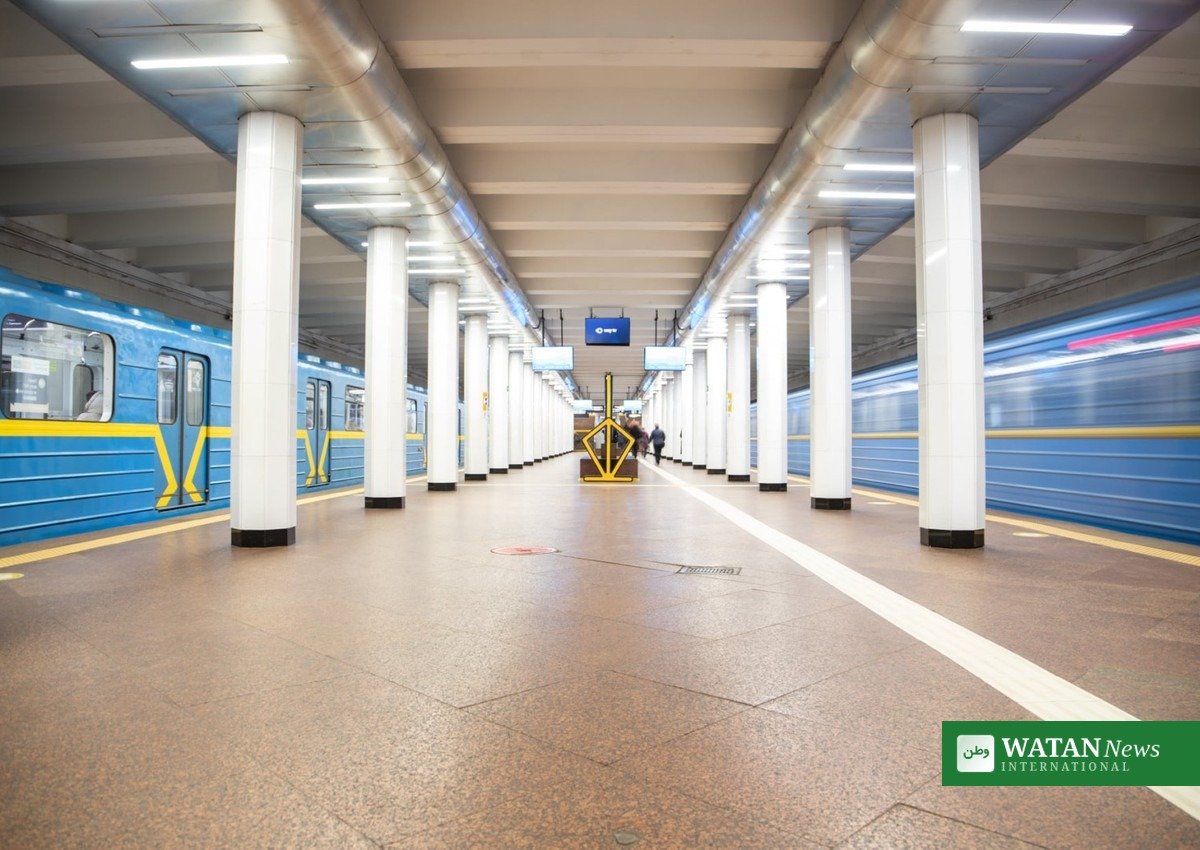 Kyiv metro station platform with blue trains in Ukraine