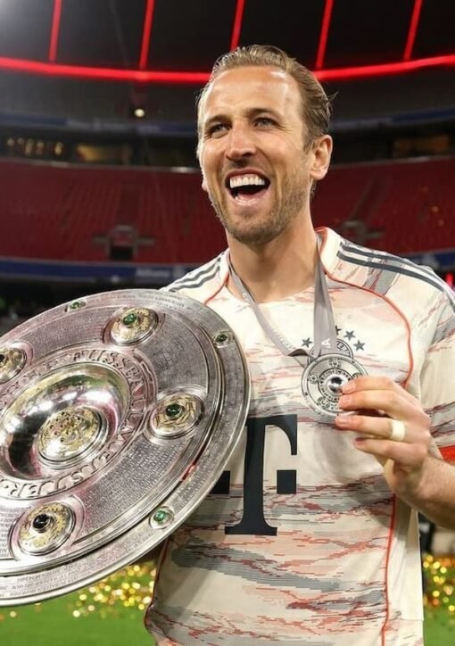 Harry Kane celebrating with Bayern Munich after winning the Bundesliga title