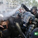 French police clash with protesters in Paris during France curfews amid riots