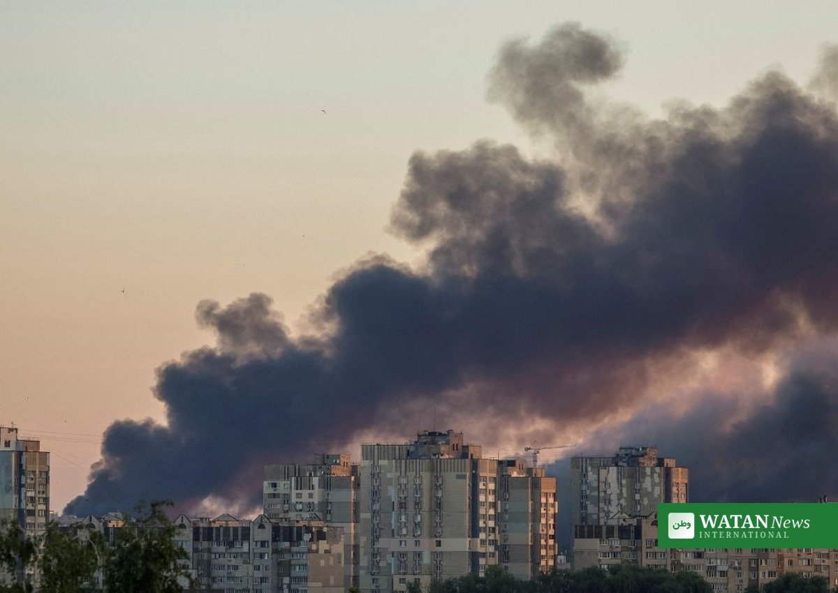 Kyiv missiles peace talks: smoke rises over residential buildings in Kyiv after a missile attack