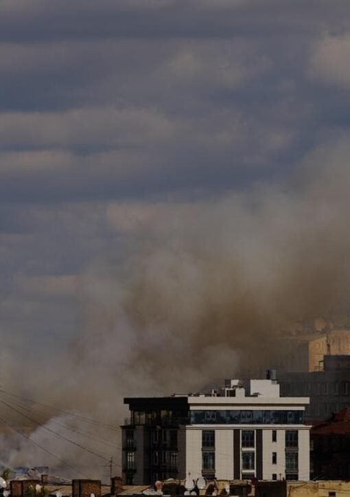 Kyiv missiles peace talks: smoke rises over residential buildings in Kyiv after a missile attack