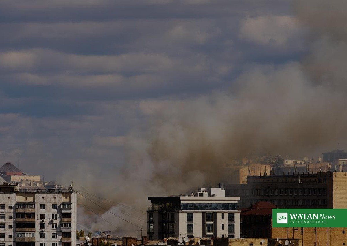 Kyiv missiles peace talks: smoke rises over residential buildings in Kyiv after a missile attack