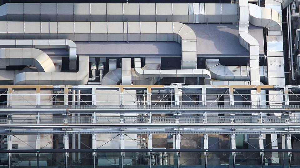 Rooftop air-conditioning and ventilation equipment on an office building in Tokyo