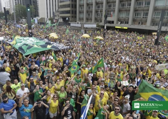 Supporters at a campaign rally in São Paulo ahead of the Brazil presidential runoff debate