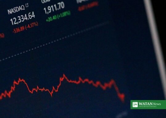 Tech stocks AI debt selloff — NASDAQ screen showing falling market values during Wall Street's AI-driven selloff