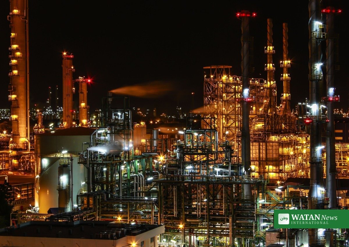 Ukraine Russia drone strikes: oil refinery lit at night, illustrating the energy infrastructure targeted in the October 17-18 offensive