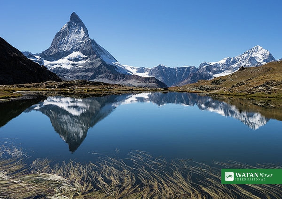 The Matterhorn reflected in an alpine lake - a Swiss luxury destinations highlight