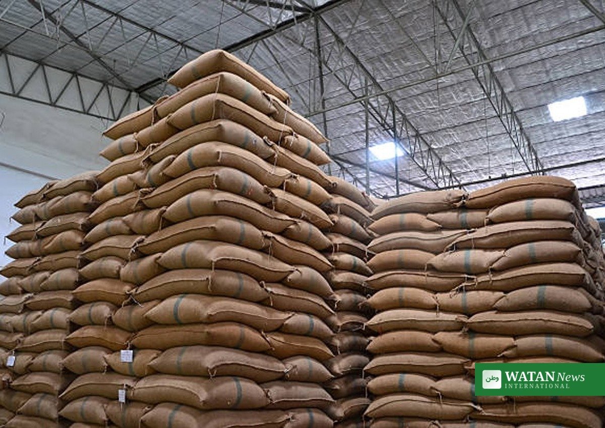 India rice production decline: stacked rice sacks in a government stockpile