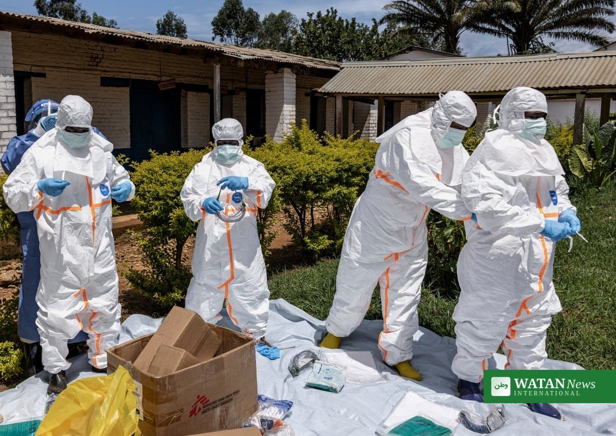 Kenya Ebola case: health workers in protective suits at an Ebola treatment centre