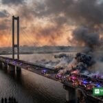 Russiske droneangreb mod Kyiv: Pivdennyj-broen ramt – røg og redningsmandskab (illustration)