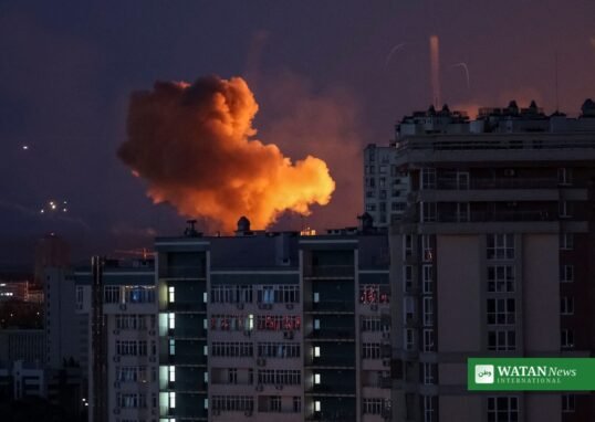 Night missile strike on Kyiv — fireball rising over apartment buildings