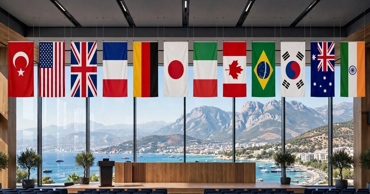 Flags of world nations at a conference hall overlooking the Antalya coast ahead of COP31 in Türkiye, as the presidency launches its 35-by-35 electrification pledge