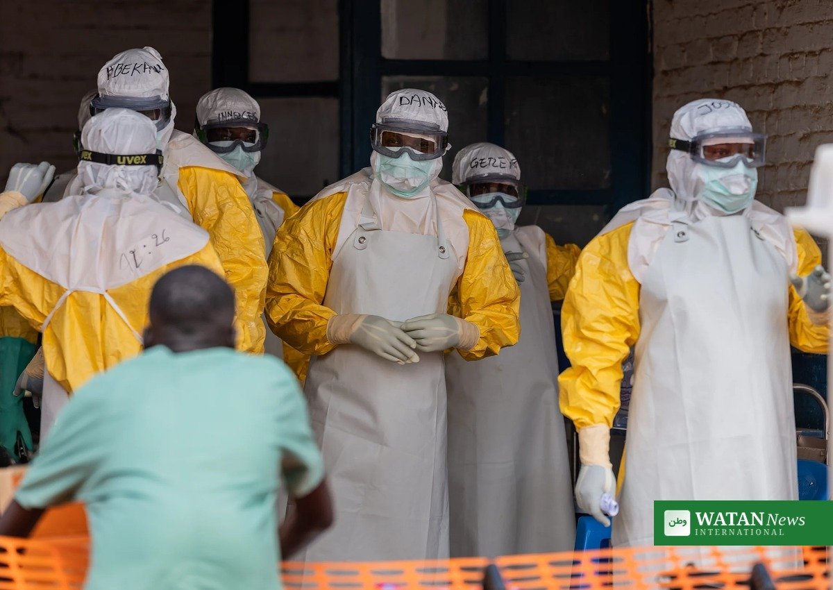 Health workers in protective equipment at an Ebola treatment centre in DR Congo